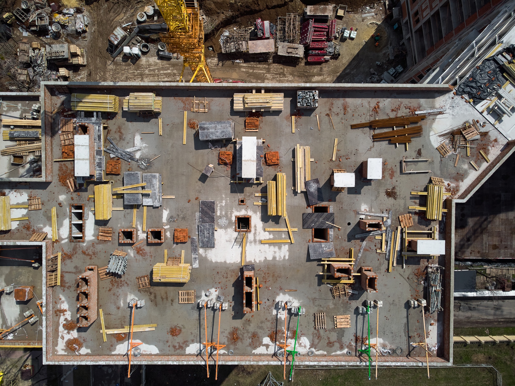 Busy Construction Site and Construction Equipment Aerial Photo
